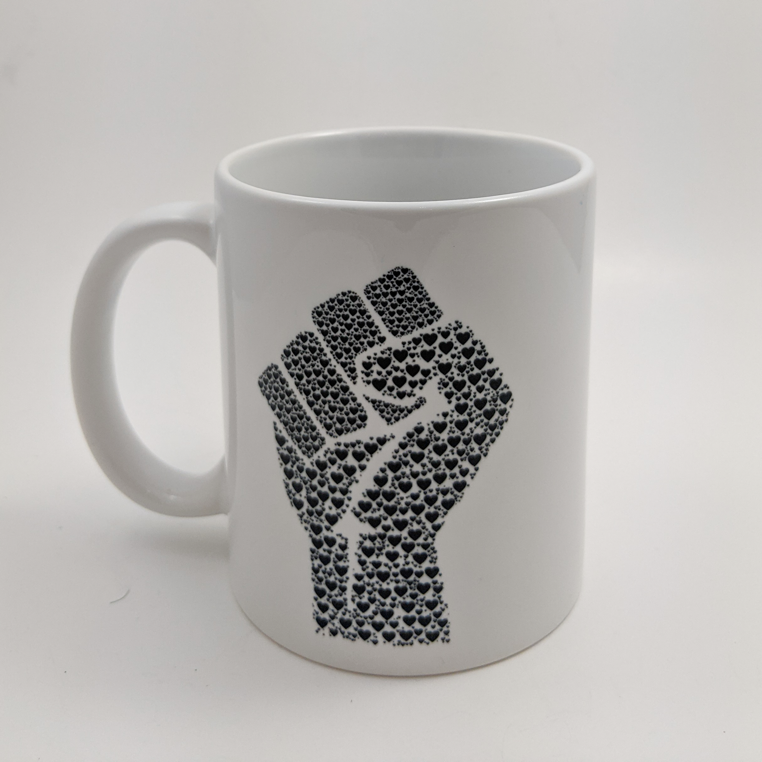 BLM Fist Mug - One Strange Bird